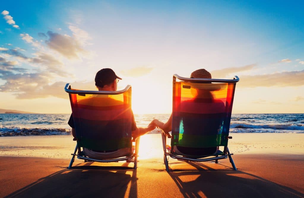 10 Minutes that Your Body will Love You for Spending 5 a couple sitting on the beach during sunset