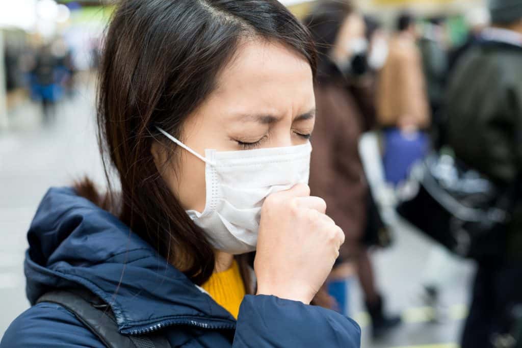 Woman suffer from sick in crowded of people